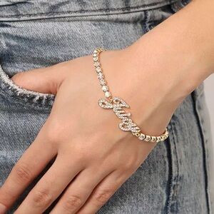 Juicy Couture Gold Bracelet with Clear Crystals